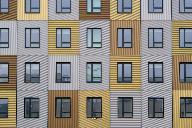 white and beige building windows